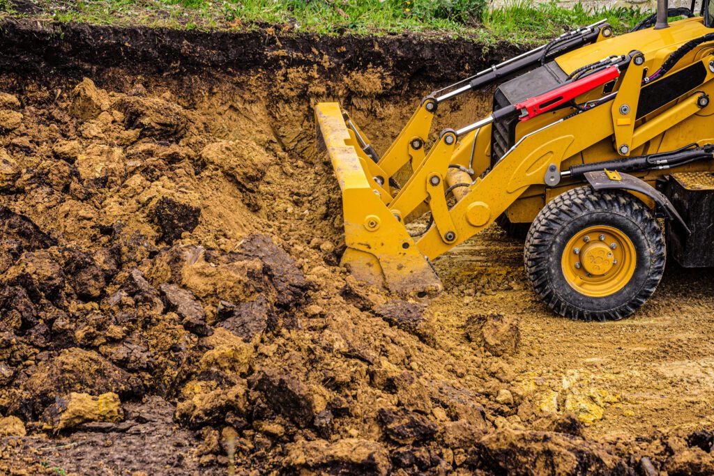 A digger doing Groundworks in London